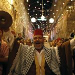 Palestinian musicians perform in Jerusalem’s Old City during celebrations to mark the breaking of fast on the second day of the holy month of Ramadan